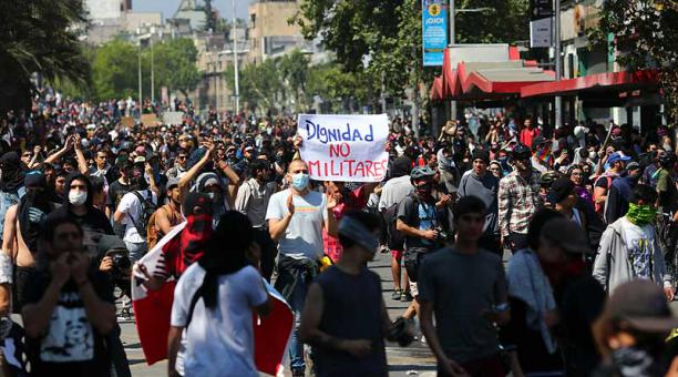 El joven ecuatoriano, de 21 años, murió por un impacto de bala en el tórax cuando participaba en las manifestaciones en Chile. Foto: AFP