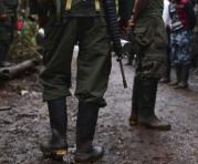 Miembros de las Fuerzas Armadas Revolucionarias de Colombia (FARC) en su campamento en El Diamante. Foto: AFP